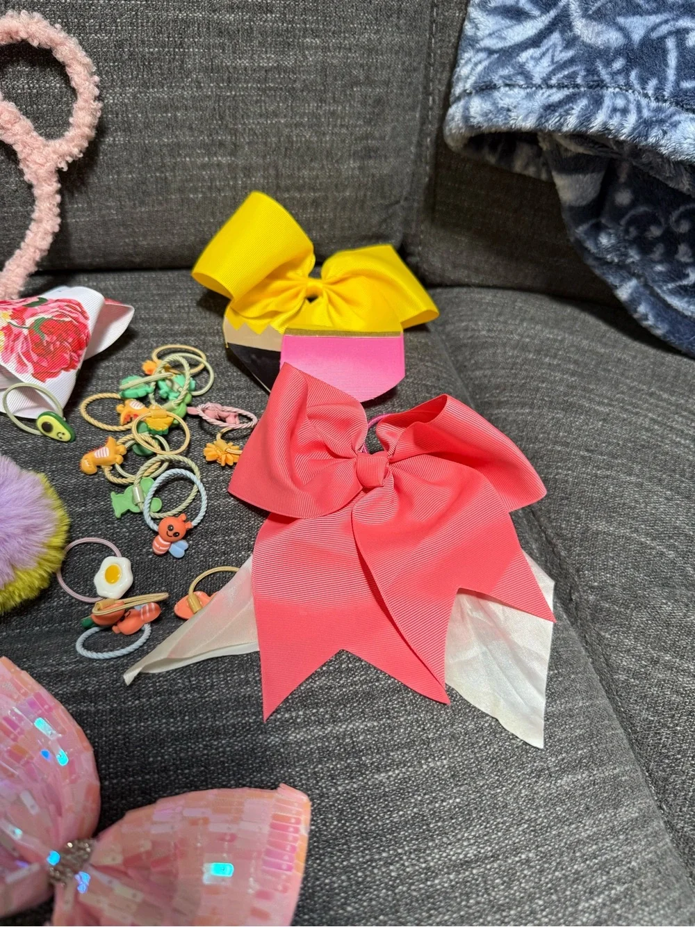 Bundle of girls hair accessories and a small little girls purse.